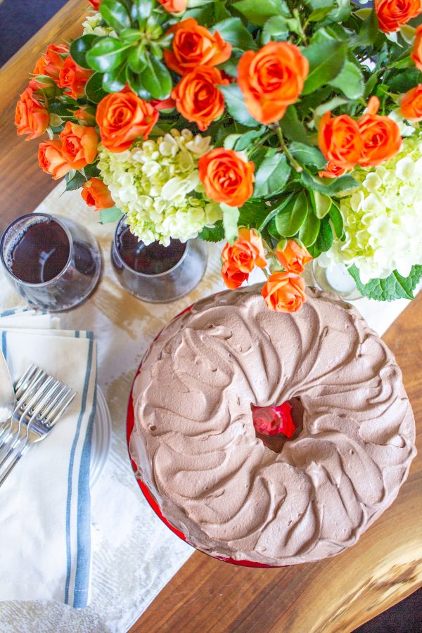 Angel Food Cake with Whipped Chocolate Frosting | This Angel Food Cake with Whipped Chocolate Frosting is light as a cloud. The frosting is made with freshly whipped cream and plenty of cocoa for a rich chocolate taste. This is a simple recipe my family has been making for decades. #cake #dessert