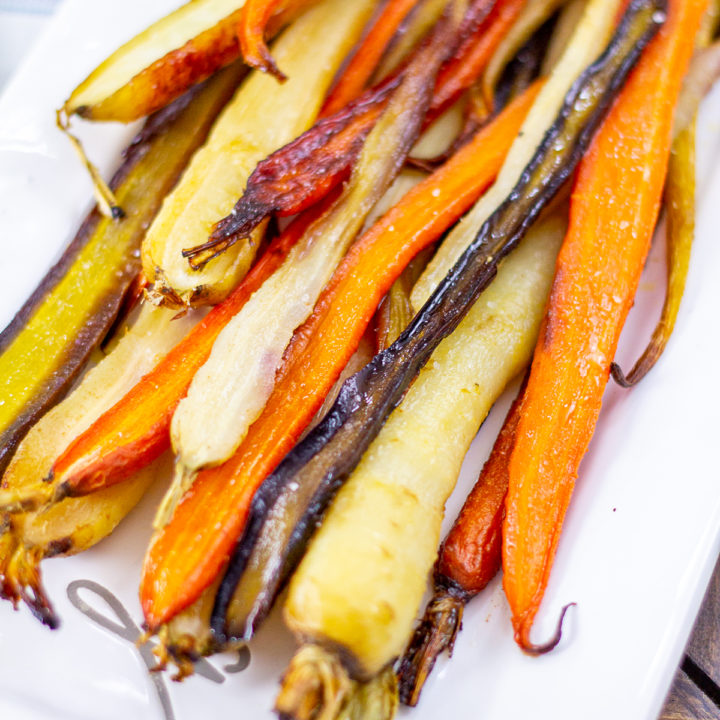 How to Make Roasted Carrots | Roasted carrots are definitely the easiest side dish, and then they are seasoned and roasted they are filled with natural sweetness and lots of flavor. This simple recipe takes just 4 ingredients and 5 minutes of active preparation time.