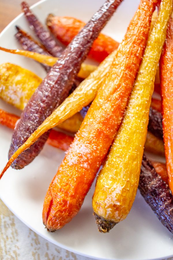 How to Make Roasted Carrots | Roasted carrots are definitely the easiest side dish, and when they are seasoned and roasted they are filled with natural sweetness and lots of flavor. This simple recipe takes just 4 ingredients and 5 minutes of active preparation time.