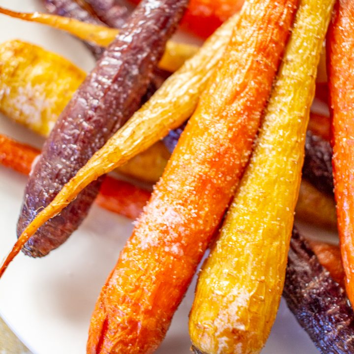How to Make Roasted Carrots | Roasted carrots are definitely the easiest side dish, and when they are seasoned and roasted they are filled with natural sweetness and lots of flavor. This simple recipe takes just 4 ingredients and 5 minutes of active preparation time.
