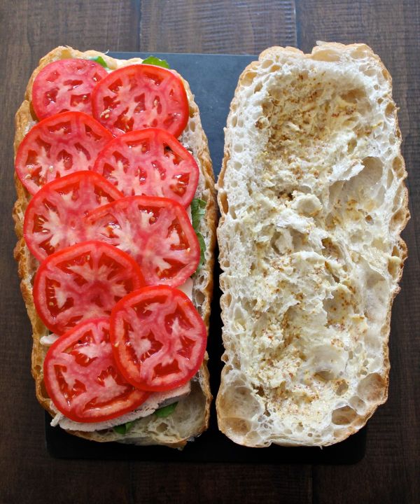 Pan Bagnat, a simple recipe for a giant sandwich to slice and share - via The Kittchen