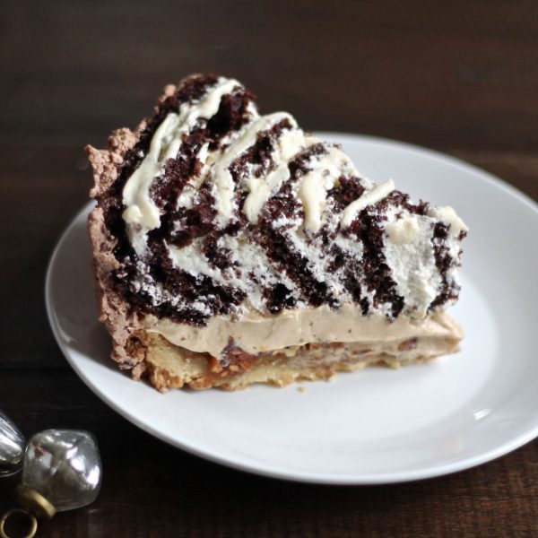 How to Make Pielogen: Pielogen is the ULTIMATE dessert! It is a pecan pie topped with a caramel cheesecake that is topped with a yule log. It's basically all the best desserts combined, into one stunning dessert mash up.