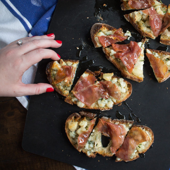 Goat Cheese, Rosemary, Honey, and Prosciutto Toasts