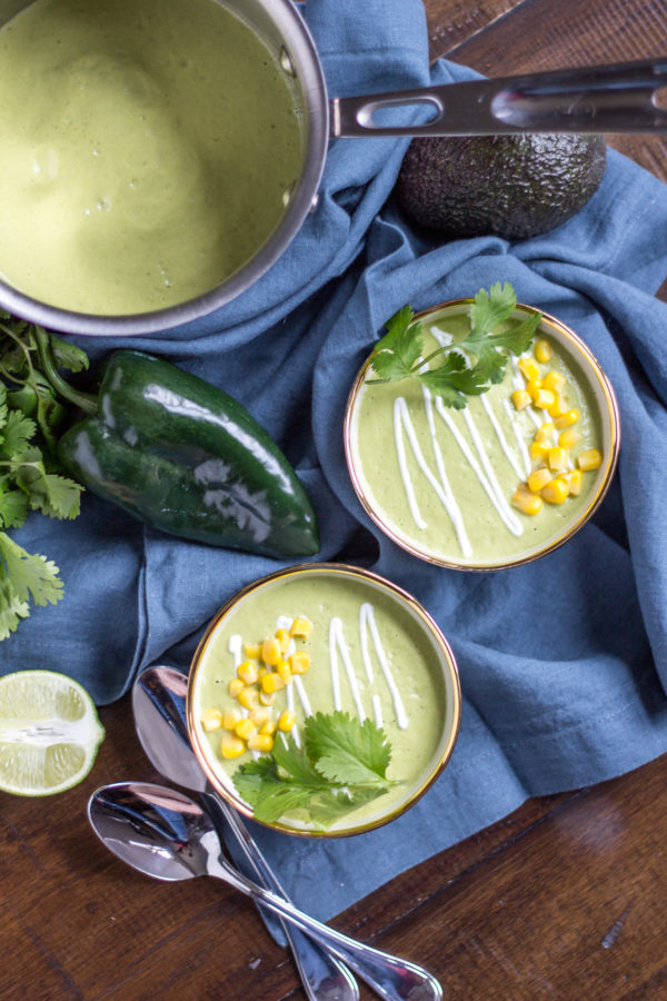 Avocado Poblano Soup | This Avocado Poblano Soup is the perfect cozy dinner to make on a chilly night. It has the spicy smokey flavor of roasted poblano peppers along with creaminess from the avocado and cream. It is bold and satisfying, and easy to make.