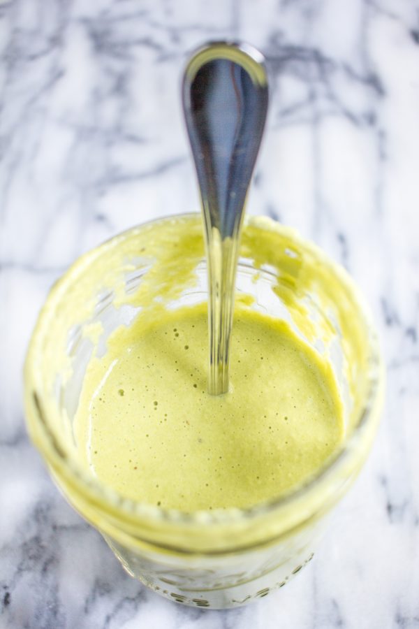 How to Make the BEST Poblano Cream Sauce - This Poblano Cream Sauce is so incredibly delicious that I am guilty of eating spoonfuls straight from the jar. This recipe for poblano cream sauce is smokey creamy and spicy. It isn't so spicy that it overwhelms other flavors, it just adds a little something extra.