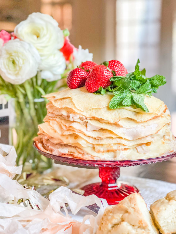 Roasted Strawberry Crepe Cake | A cake made with 25 layers of crepes filled with roasted strawberry custard. It looks so beautiful that people instantly get excited about it.