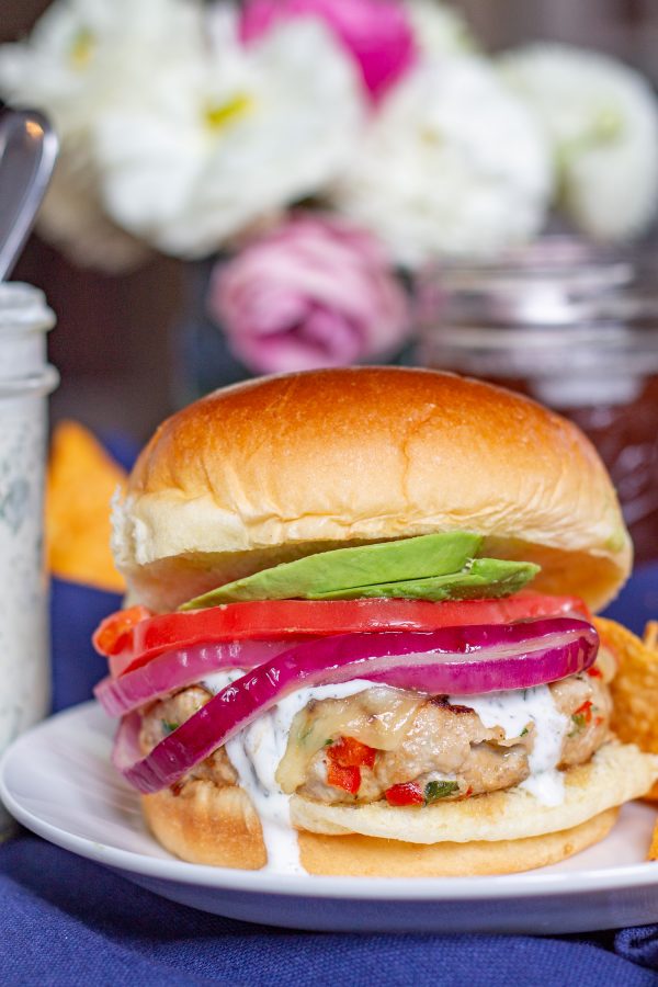 These Southwest Turkey Burgers are loaded with chopped bell pepper, poblano pepper, onion, garlic, and spices so that they are bursting with flavor. These Southwest Turkey Burgers are an easy to make healthy alternative to a beef burger.