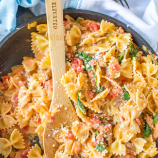 Sweet and Spicy Sausage and Farfalle is a recipe that I grew up eating, and fell in love with again as an adult. It is one of the easiest recipes you can ask for, and the speedy preparation time makes it a perfect weeknight dinner option and an easy recipe for beginners.