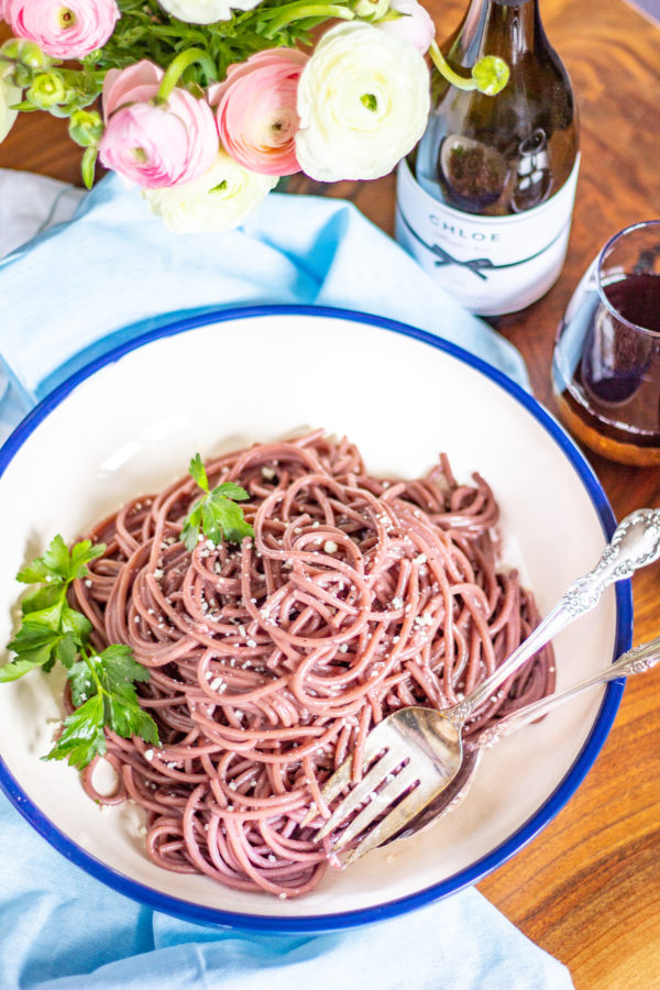 Red Wine Cacio e Pepe is a modern spin on a classic Italian recipe. The pasta is cooked in red wine, giving it a richer flavor.