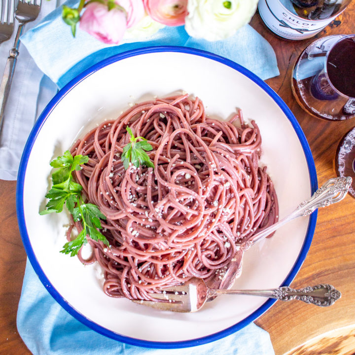 Cacio e Pepe is one of my favorite pastas, and I decided to give it a modern twist to create Red Wine Cacio e Pepe. Instead of cooking the pasta in water, I cooked the pasta in red wine.