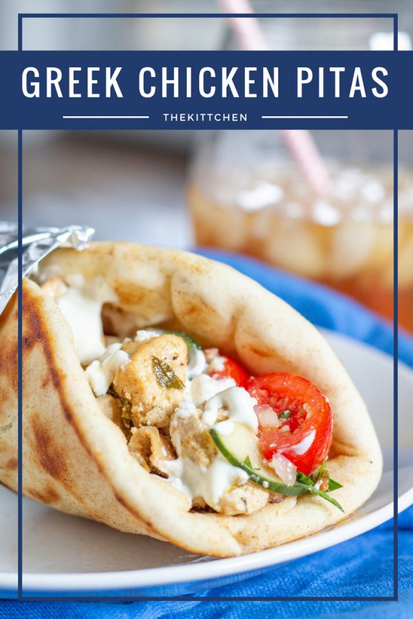 Greek Chicken Pita Recipe | Greek Chicken Pitas made with chicken marinated in yogurt, lemon, and spices and served in pita bread with tzatziki and veggies.
