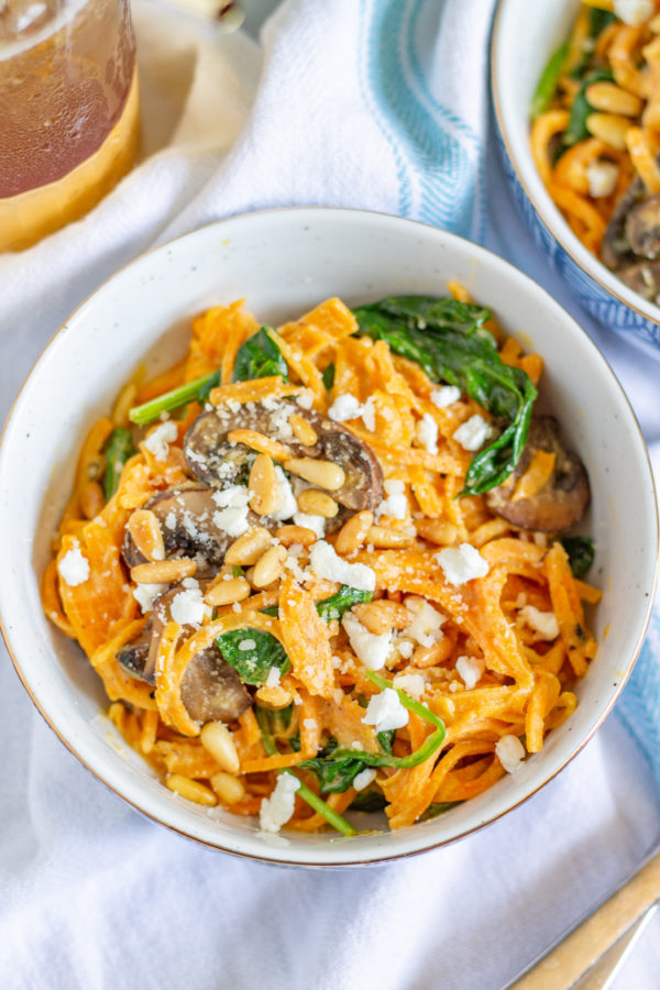 Sweet Potato Noodles with a Goat Cheese Sauce, Mushrooms, Spinach, and Pine Nuts