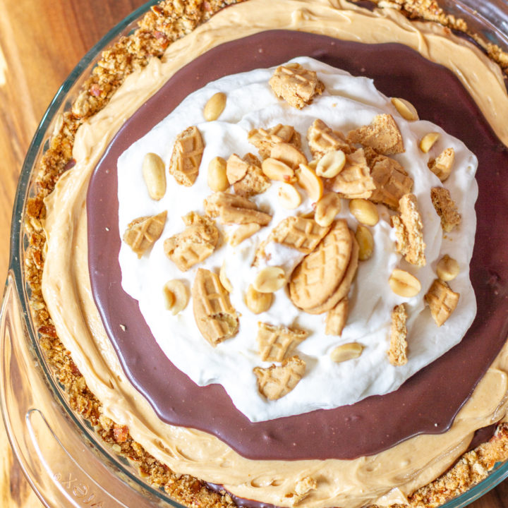 This Chocolate Peanut Butter Pie combines creamy peanut butter, rich chocolate, and light fluffy whipped cream in a salty pretzel crust. The best thing is that this pie comes together in just minutes.