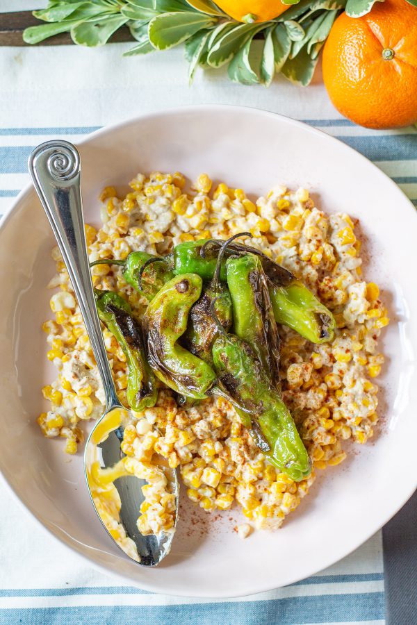 Creamy Parmesan Lime Corn and Shishito Peppers | This Creamy Parmesan Lime Corn and Shishito Peppers recipe brings together fresh corn in a creamy and citrusy Parmesan lime sauce and blistered shishito peppers. #thanksgiving