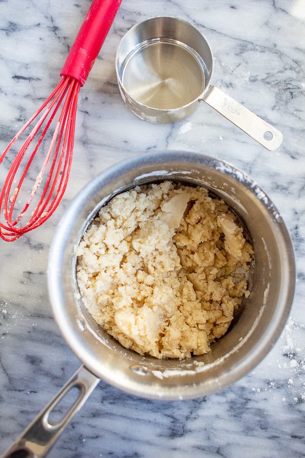 Easy No Roll Shortbread Pie Crust | This is the fastest and easiest way to make a pie crust. This 4 ingredient pie crust comes together on the stovetop and gets pressed in to a pie pan.