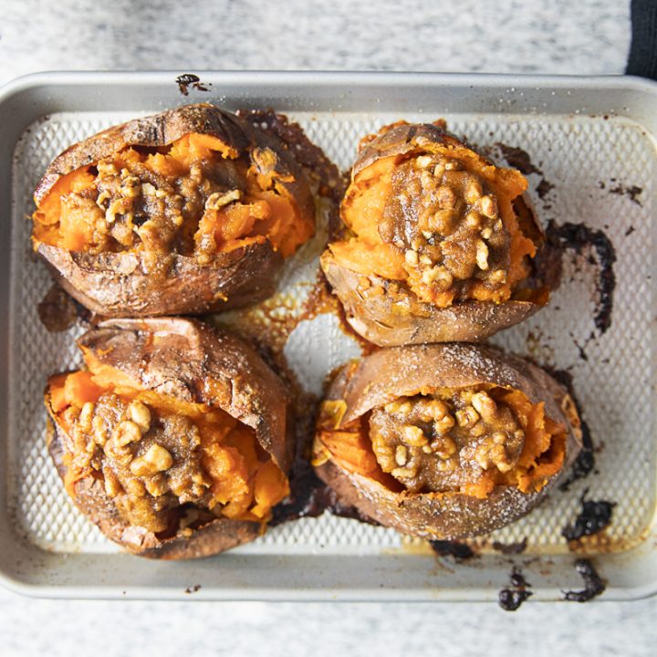 Twice Baked Sweet Potatoes are mashed with butter, maple syrup, and sea salt, and then topped with a butter, pecan, and brown sugar topping. It’s the ultimate combination of sweet, salty, and nutty flavors.