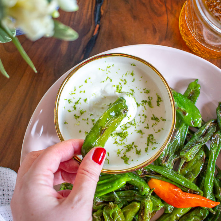 These Shishito Peppers with a Parmesan Lime Sauce for dipping are an on-trend appetizer to serve at your next party.