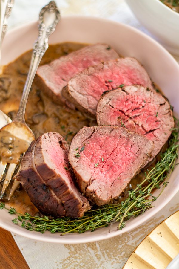 Beef Tenderloin with a Sherry Mushroom Gravy | This 45-minute beef tenderloin recipe has a rich and delicious mushroom sherry gravy with just a touch of cream.