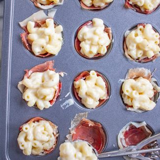 Mac and Cheese Bites | How to make macaroni and cheese bites wrapped with prosciutto and topped with Cheez-It crumbs.