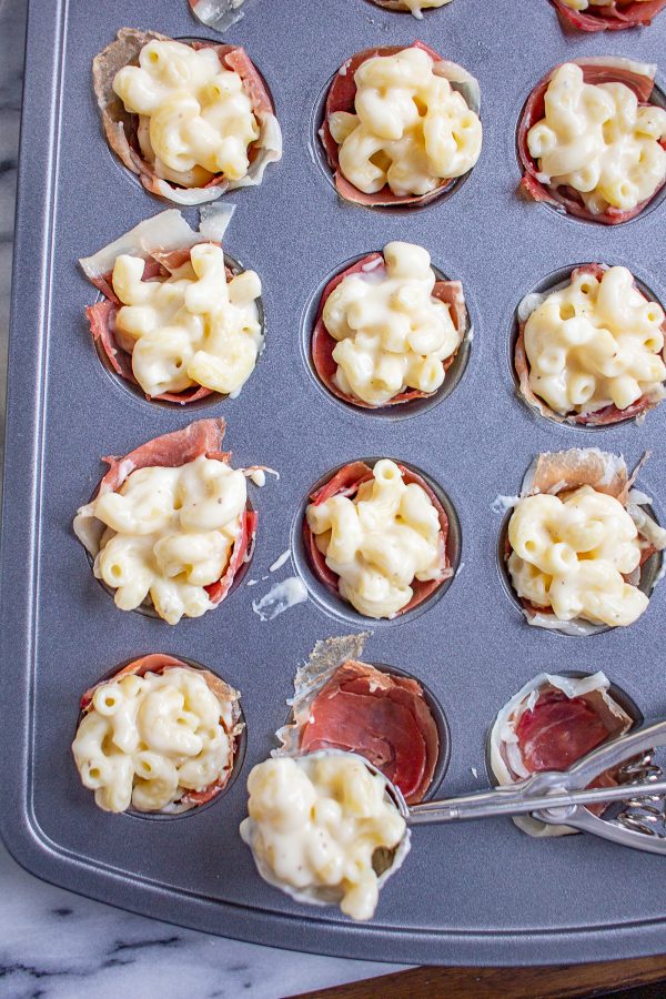 Mac and Cheese Bites | How to make macaroni and cheese bites wrapped with prosciutto and topped with Cheez-It crumbs.