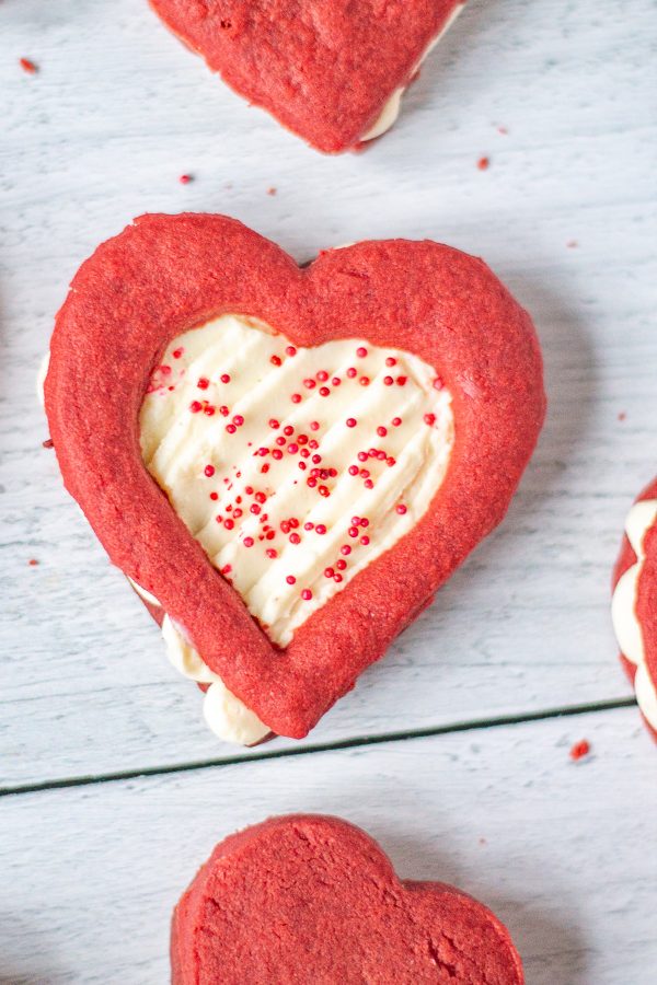 Red Velvet Shortbread Cookies with Cheesecake Filling are a Valentine's Day treat your sweetheart will love. These cookies take the flavor of a red velvet cupcake, and put it into a cookie. 
