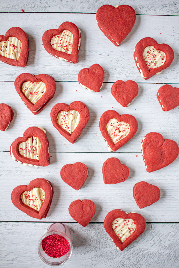 Red Velvet Shortbread Cookies with Cheesecake Filling are a Valentine's Day treat your sweetheart will love. These cookies take the flavor of a red velvet cupcake, and put it into a cookie.