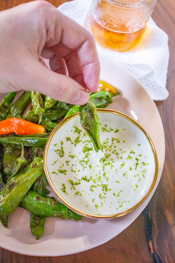 Shishito Peppers with a Parmesan Lime Sauce | These Shishito Peppers with a Parmesan Lime Sauce for dipping are an on-trend appetizer to serve at your next party.
