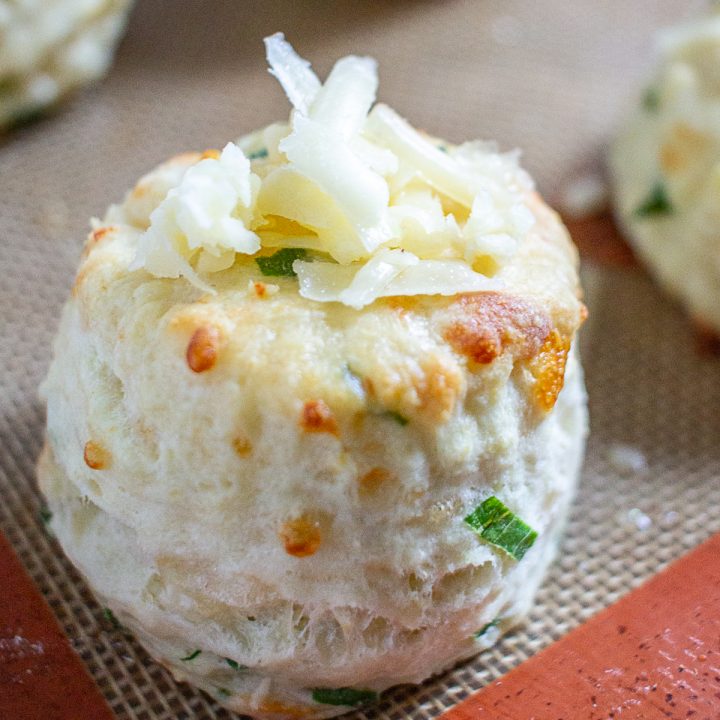 Cheddar and Green Onion Biscuits are easy to make with just 20 minutes of active preparation time. These biscuits are the ideal combination of buttery and cheesy, with a nice fresh flavor from the green onion.