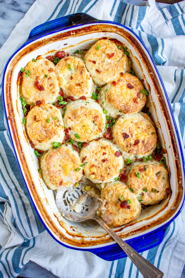 Chicken Bacon Ranch Biscuit Casserole combines all my favorite food groups into one comfort food casserole. The chicken filling is made with shredded chicken, bacon, mushrooms, celery, corn, onion, and corn in a creamy ranch sauce. 