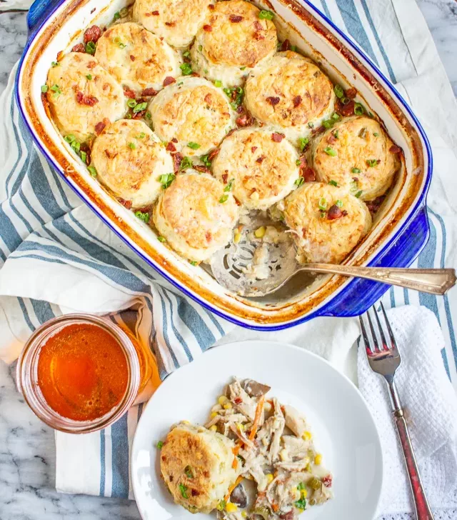 Chicken Bacon Ranch Biscuit Casserole combines all my favorite food groups into one comfort food casserole. The chicken filling is made with shredded chicken, bacon, mushrooms, celery, corn, onion, and corn in a creamy ranch sauce. 