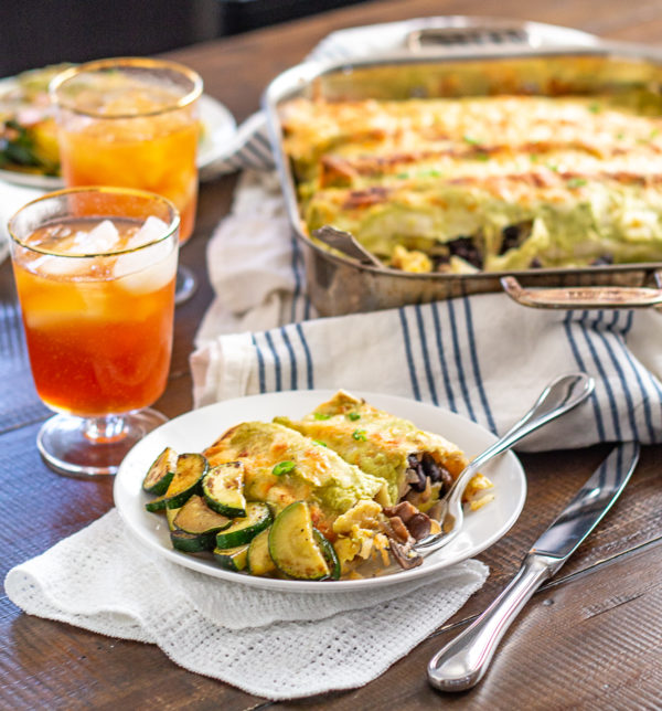Breakfast Enchiladas are a hearty breakfast (or brunch) that feeds a crowd. It’s perfect for times when you are hosting guests, or nights when you want to have breakfast for dinner.