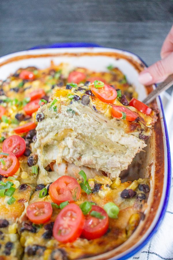 Chicken Mexican Lasagna is a delicious meal made with shredded chicken coated in poblano cream sauce layered between flour tortillas with black beans, corn, salsa, and cheese.