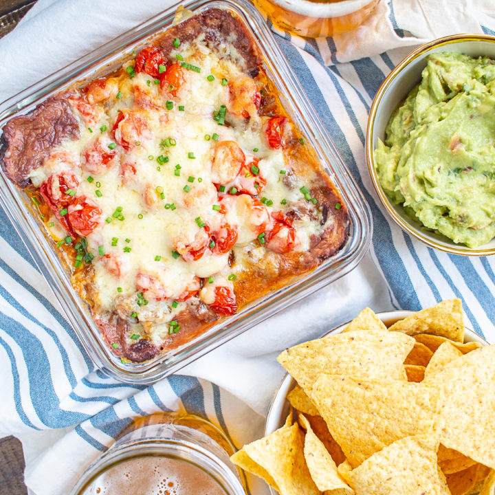 Baked Taco Dip | An easy to make six layer taco dip that gets served hot!