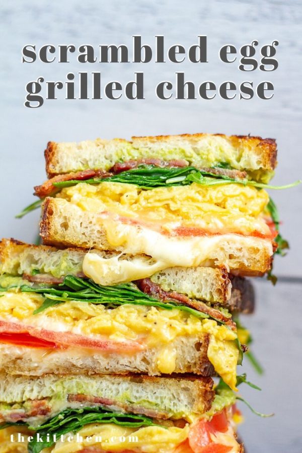 Scrambled Egg Grilled Cheese | This meal is part breakfast sandwich and part grilled cheese. I added scrambled eggs, mashed avocado, cheddar, bacon, tomato, and spinach - all of the ingredients I like to add to a breakfast sandwich.