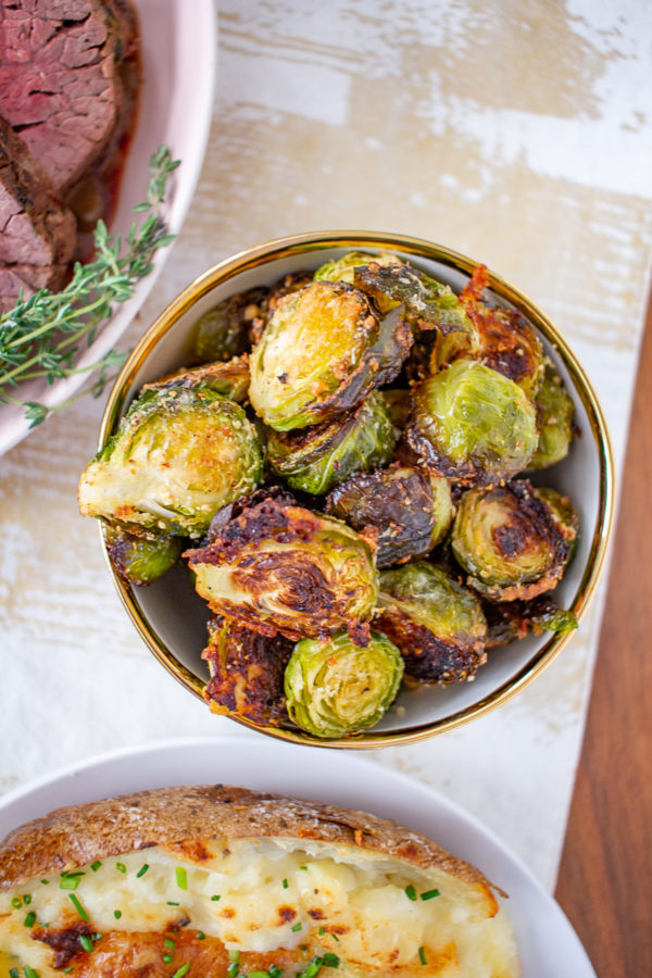 Garlic Parmesan Roasted Brussels Sprouts | These Roasted Garlic Parmesan Brussels Sprouts are a fuss-free vegetable side dish that can be made with just moments of active preparation time.
