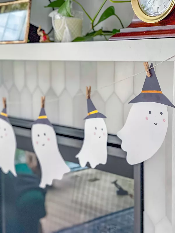 Easy DIY Halloween Decoration: A Ghost Garland is a cute and spooky addition to Halloween decor